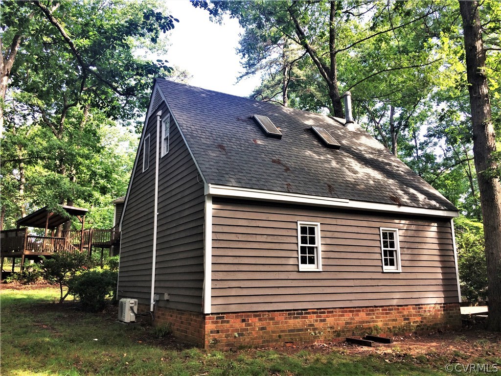 2910 Old Gun Road West Midlothian, VA 23113 - Photo 6 of 30 a view of house with a yard