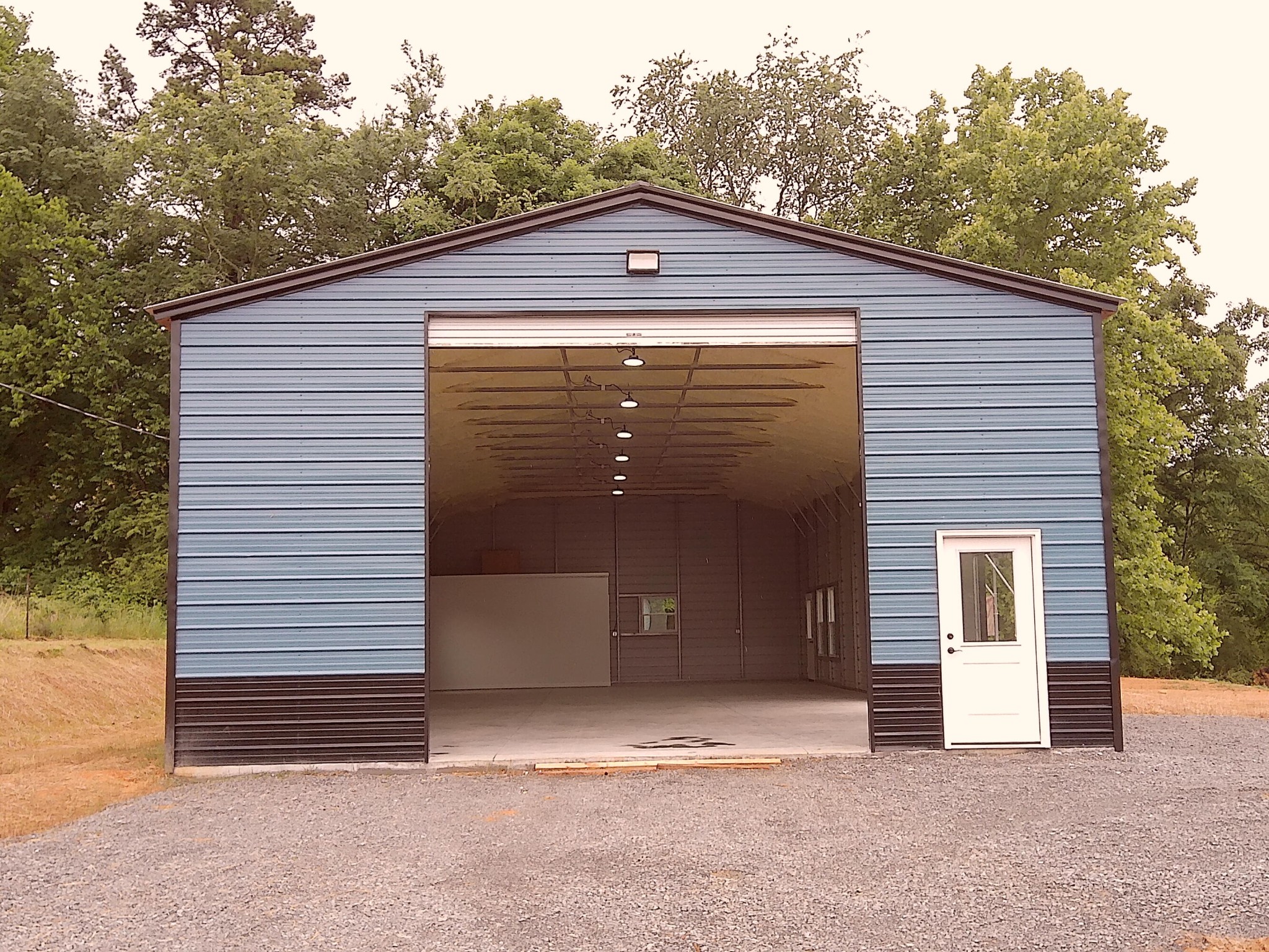 5668 Tennessee 58 Decatur, TN 37322 - Photo 3 of 24 a front view of a house with a garage