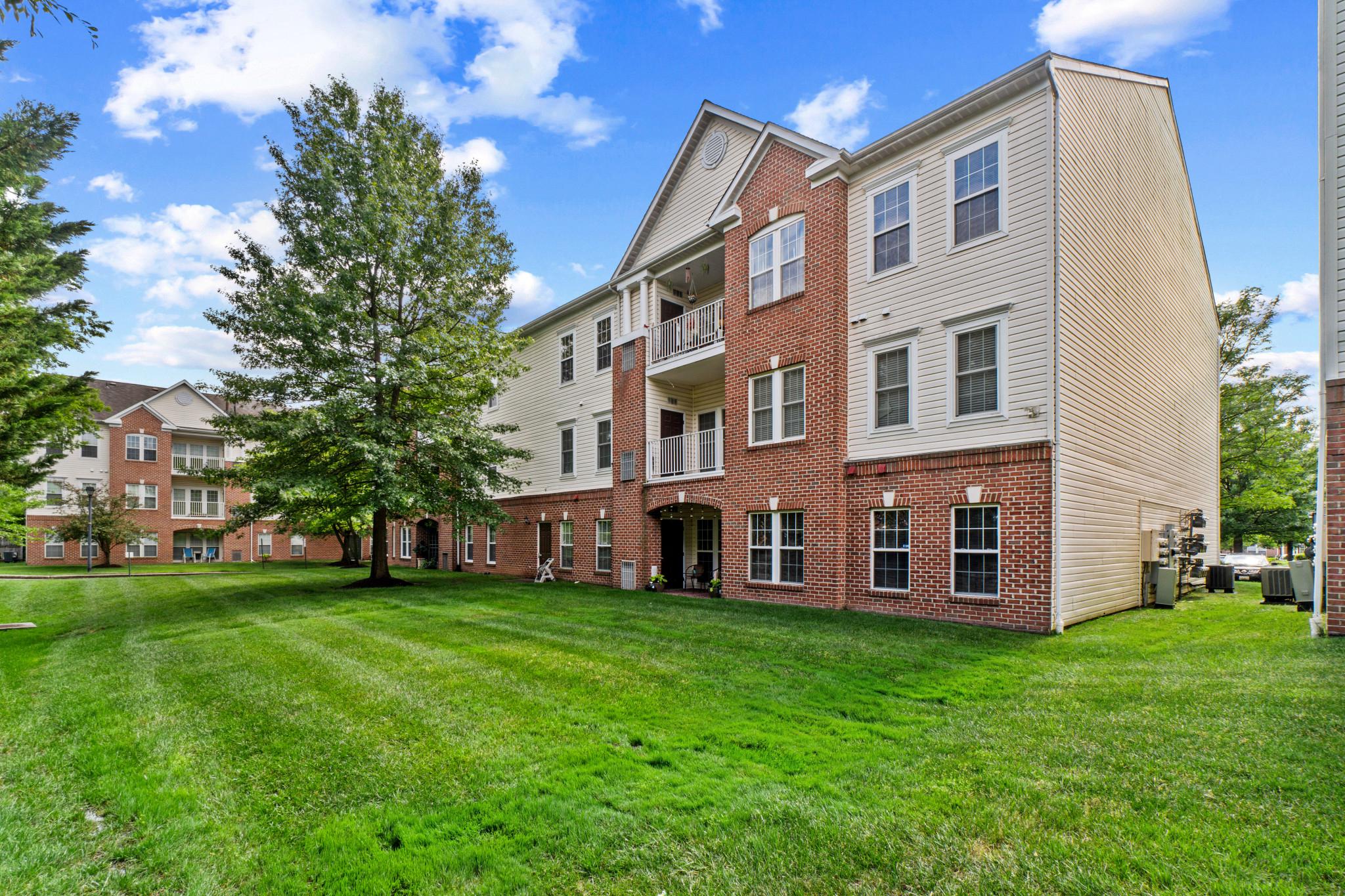 5144 Brightleaf Court, Unit 5144 Rosedale, MD 21237 - Photo 35 of 35 Charming brick condo with lush lawn.