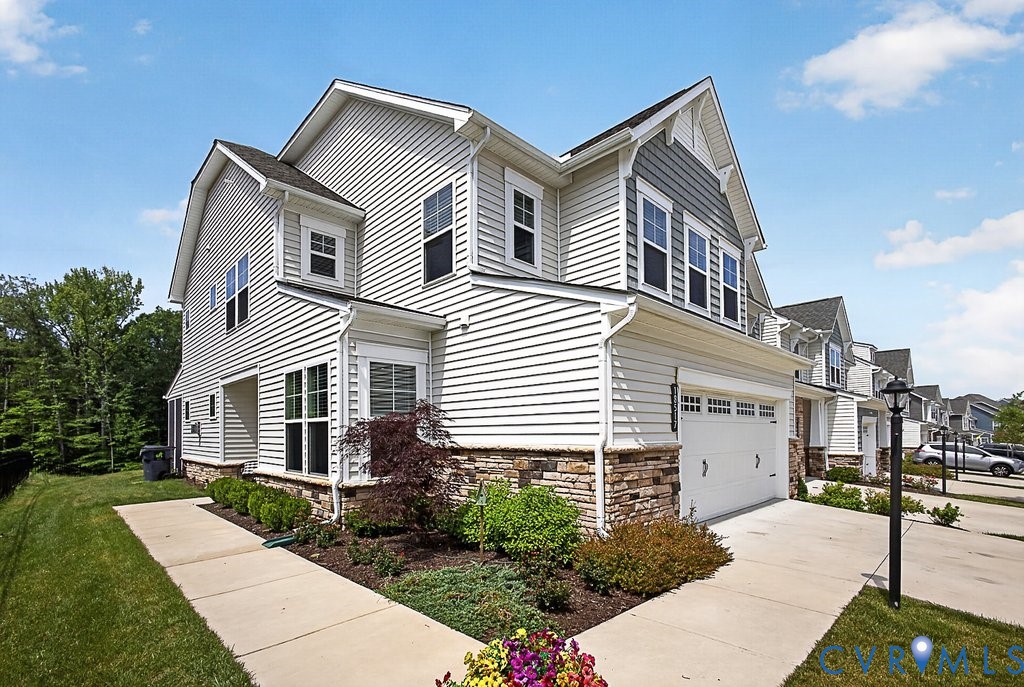 18517 Palisades Ridge Moseley, VA 23120 - Photo 43 of 55 a front view of a house with a yard