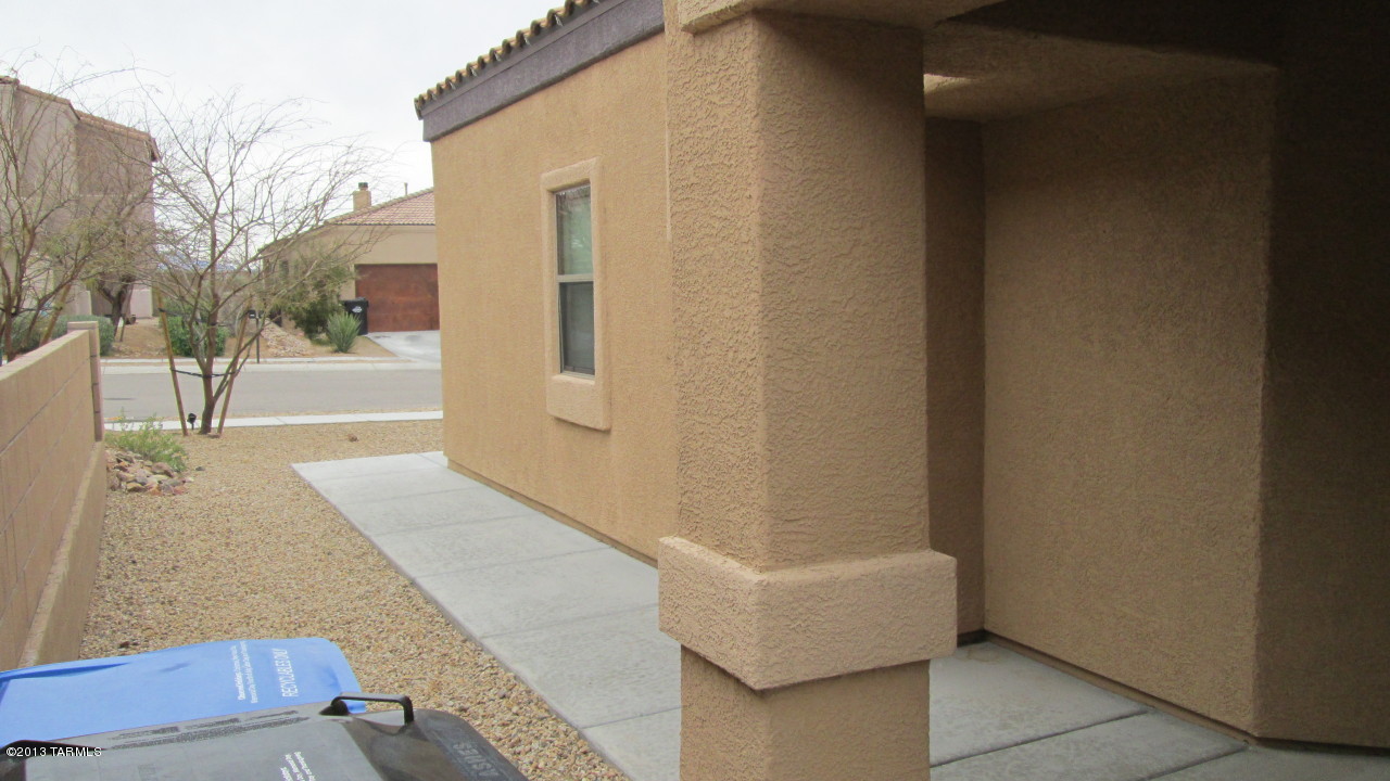 10855 East New Rock Ridge Drive Vail, AZ 85641 - Photo 2 of 34 a view of a house with couches and table