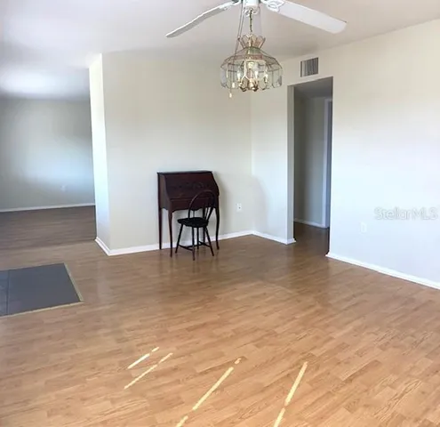 a view of livingroom with kitchen