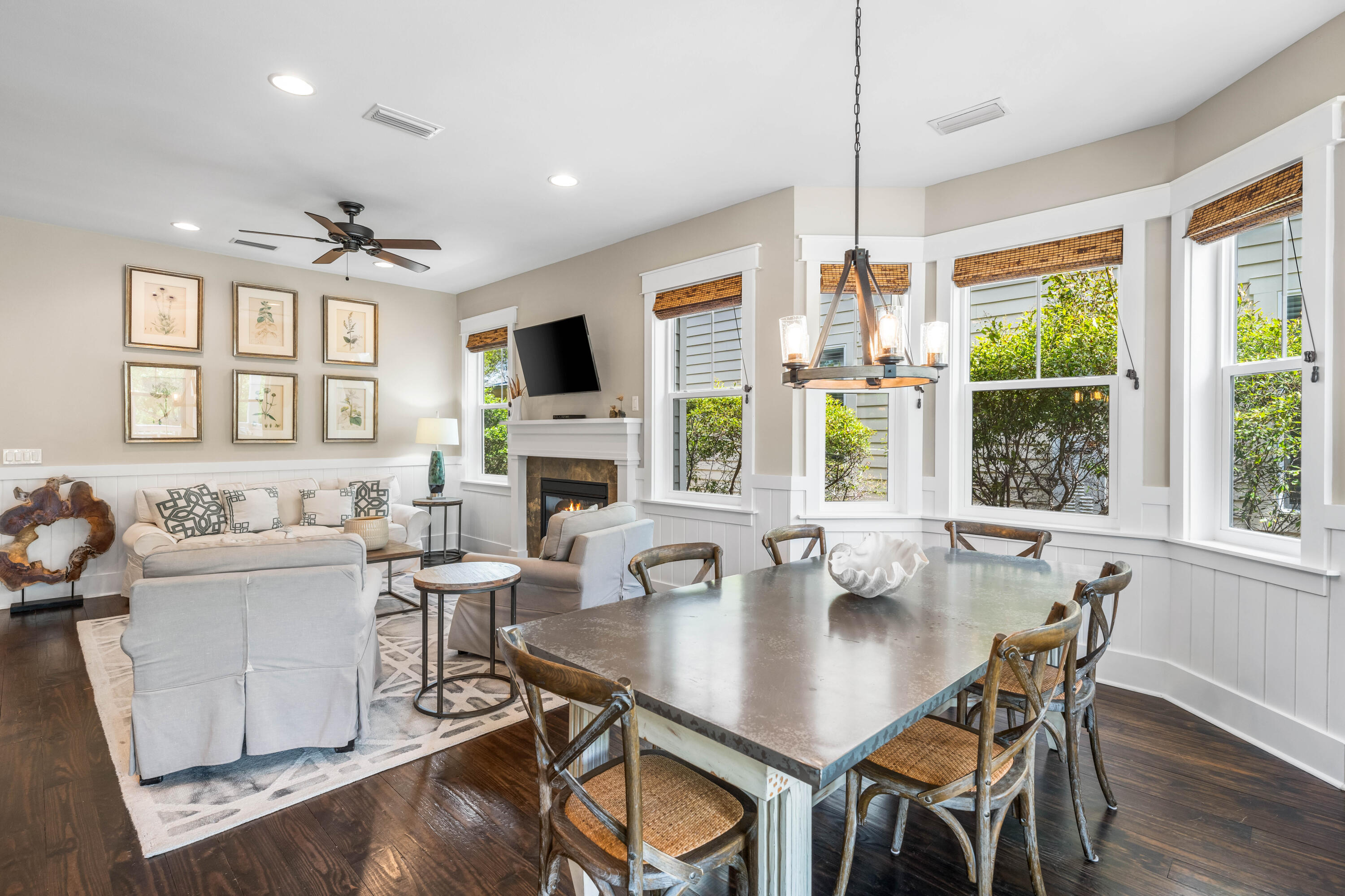 979 Sandgrass Boulevard Santa Rosa Beach, FL 32459 - Photo 12 of 72 a view of a dining room with furniture window and wooden floor