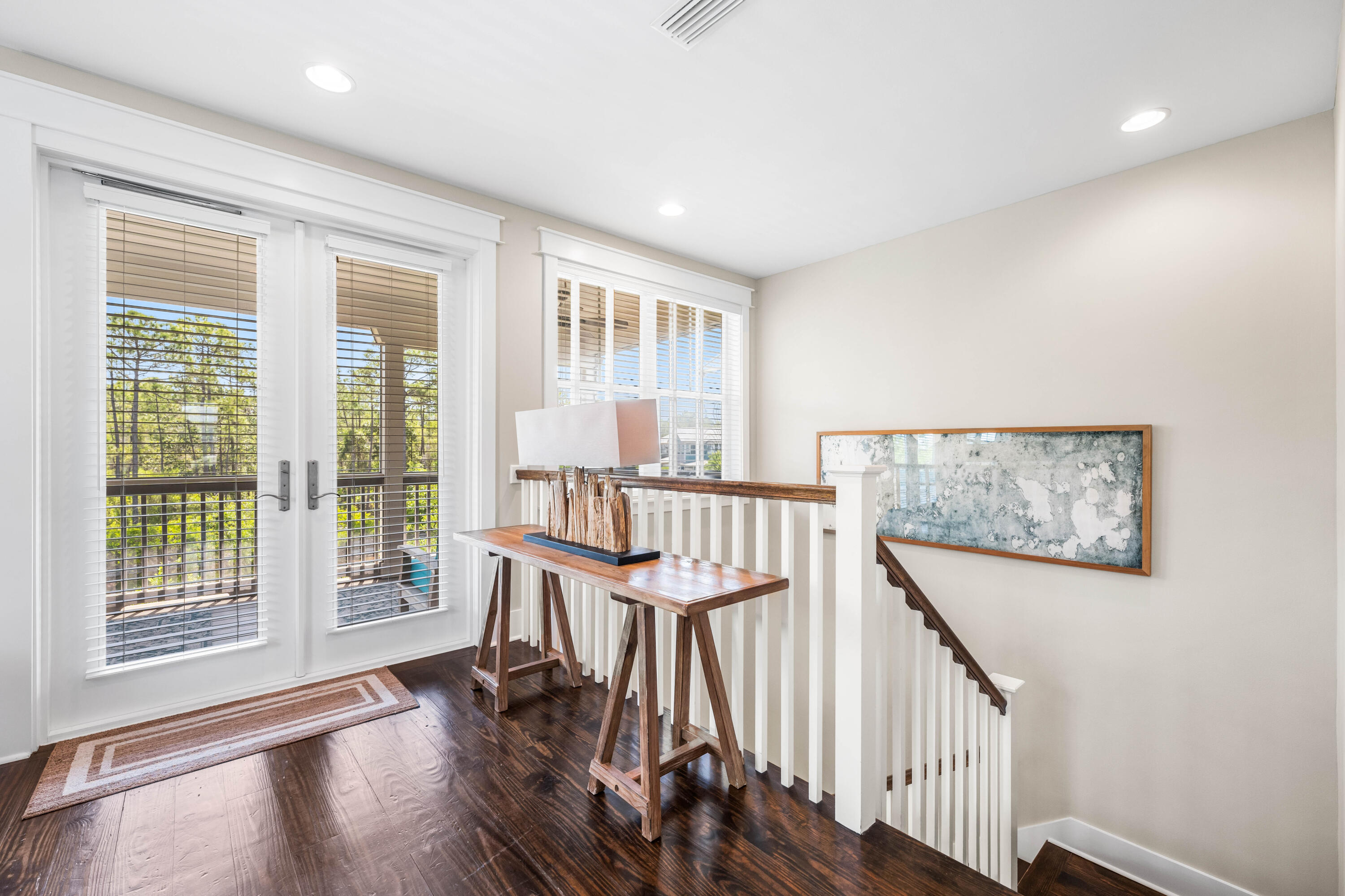 979 Sandgrass Boulevard Santa Rosa Beach, FL 32459 - Photo 23 of 72 a view of entryway with wooden floor and front door