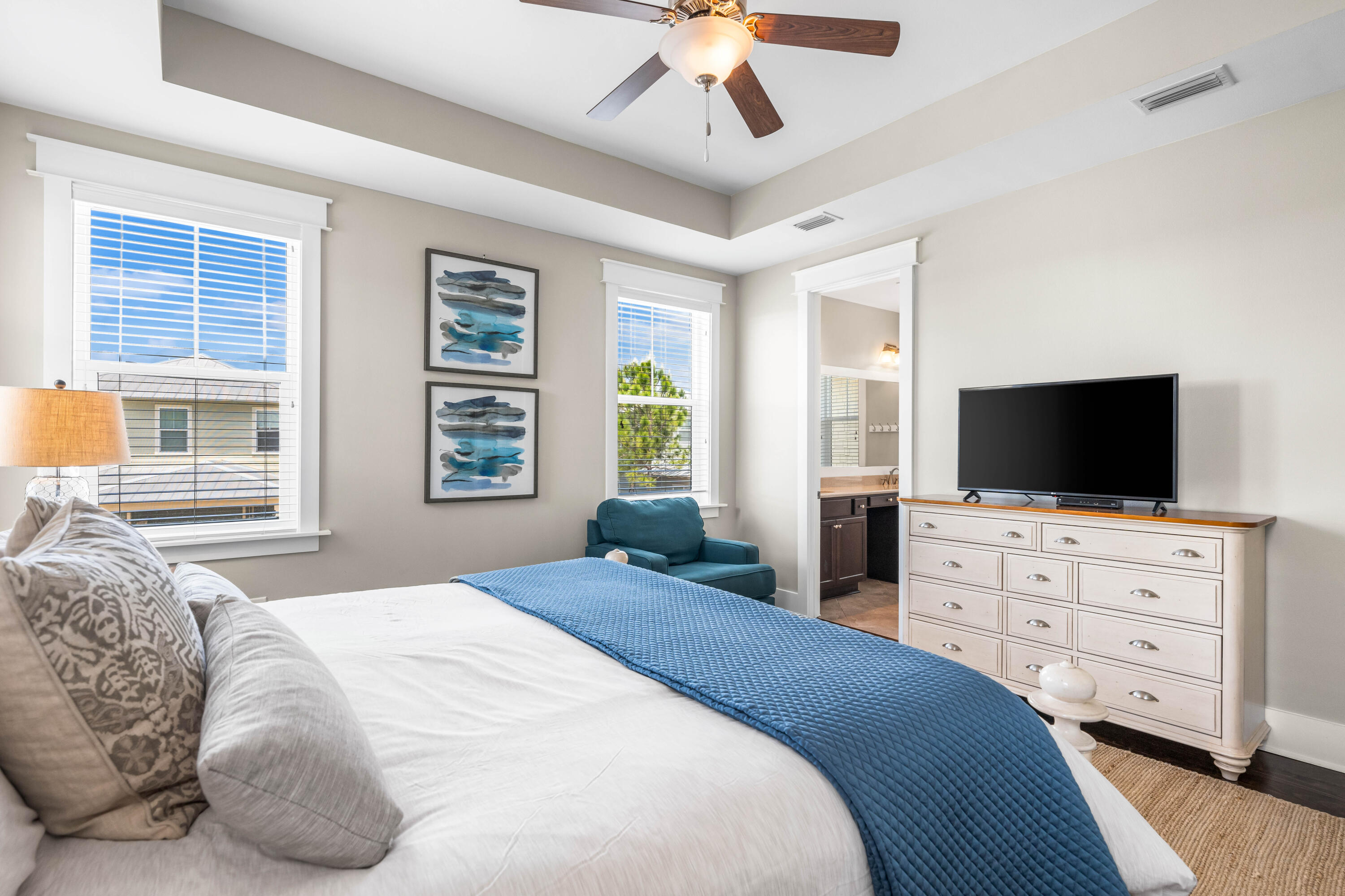 979 Sandgrass Boulevard Santa Rosa Beach, FL 32459 - Photo 32 of 72 a bedroom with a large bed and flat tv