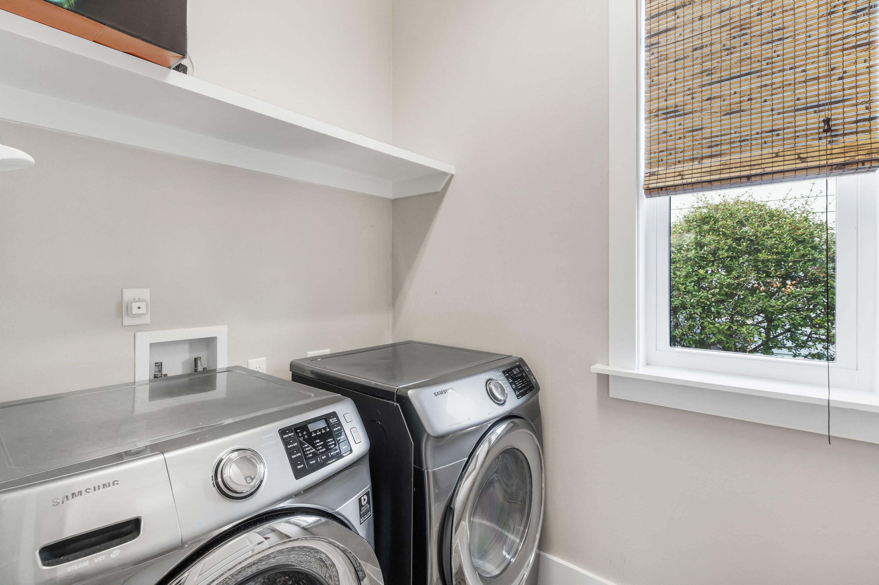 979 Sandgrass Boulevard Santa Rosa Beach, FL 32459 - Photo 37 of 72 a utility room with dryer and washer