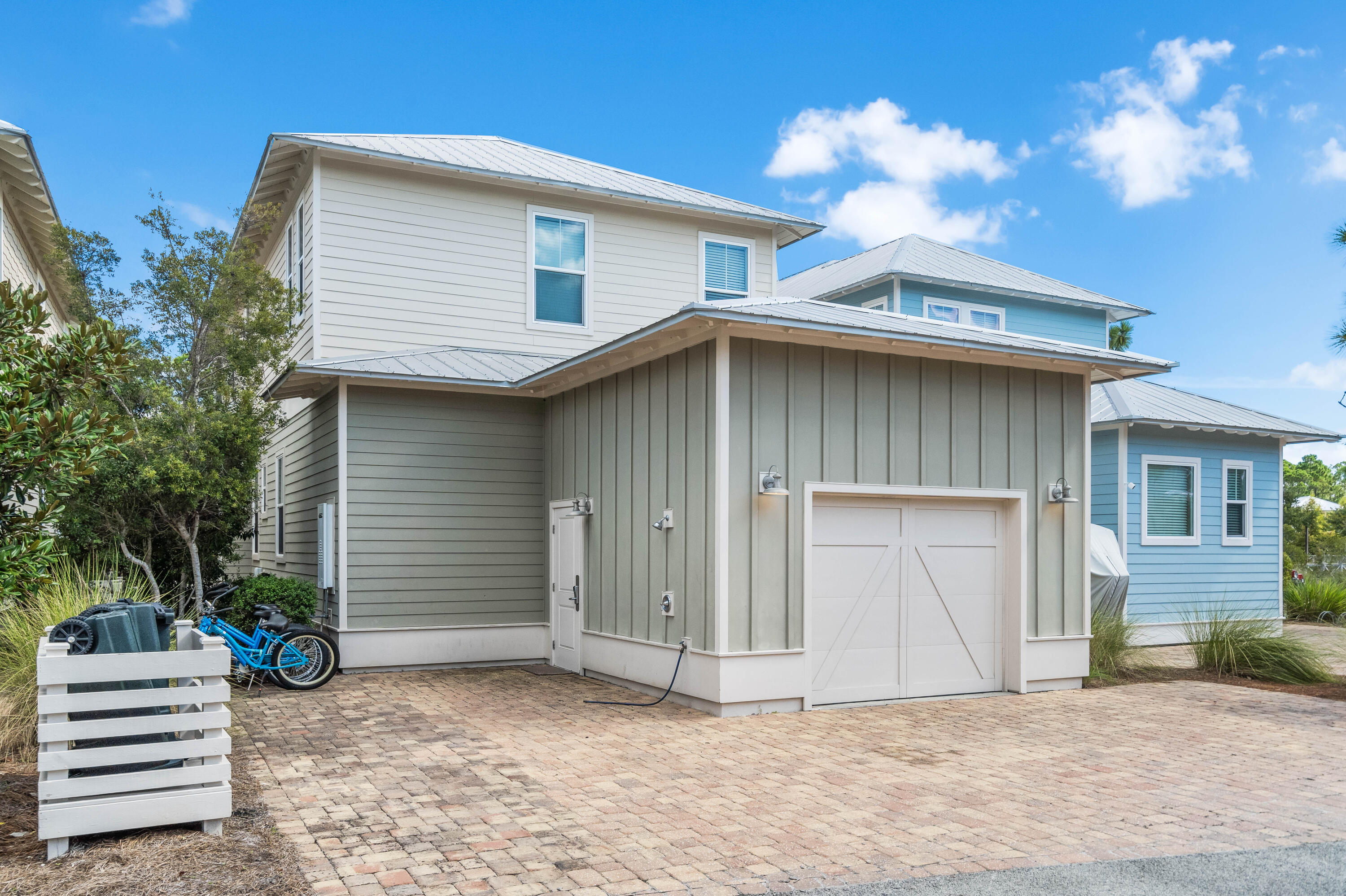 979 Sandgrass Boulevard Santa Rosa Beach, FL 32459 - Photo 49 of 72 a front view of a house with a yard