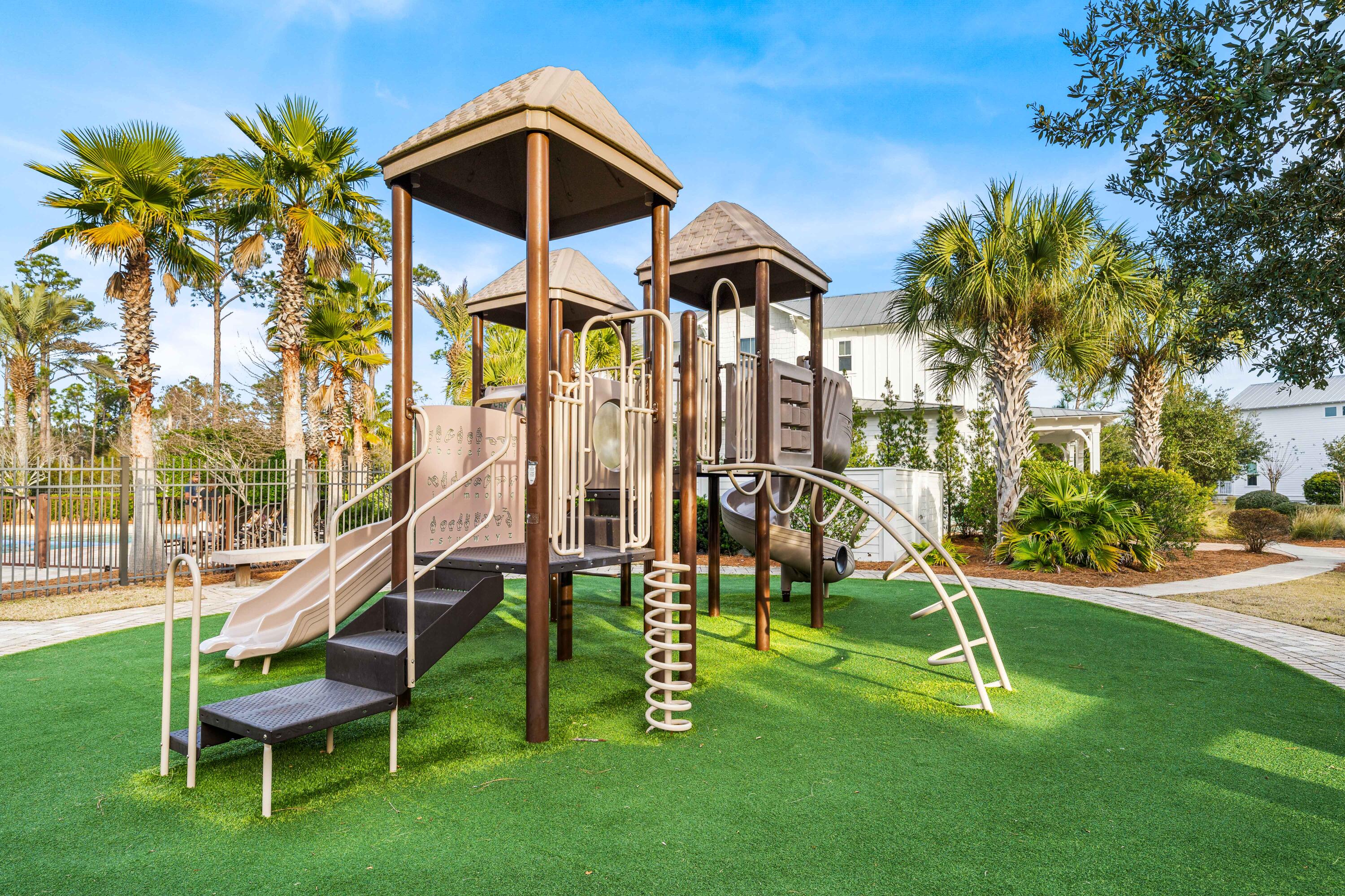 979 Sandgrass Boulevard Santa Rosa Beach, FL 32459 - Photo 71 of 72 a view of a house with a yard