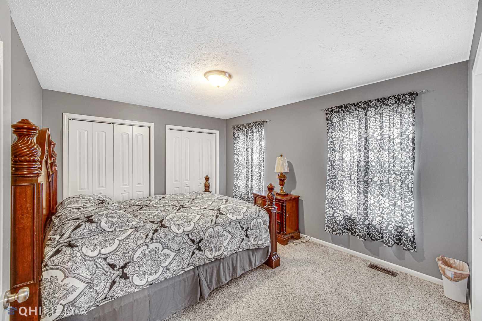 3208 Old Castle Road Joliet, IL 60431 - Photo 11 of 19 a bedroom with a bed and a window