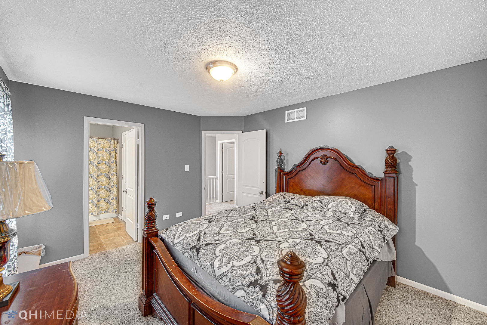 3208 Old Castle Road Joliet, IL 60431 - Photo 12 of 19 a bedroom with a bed and dresser