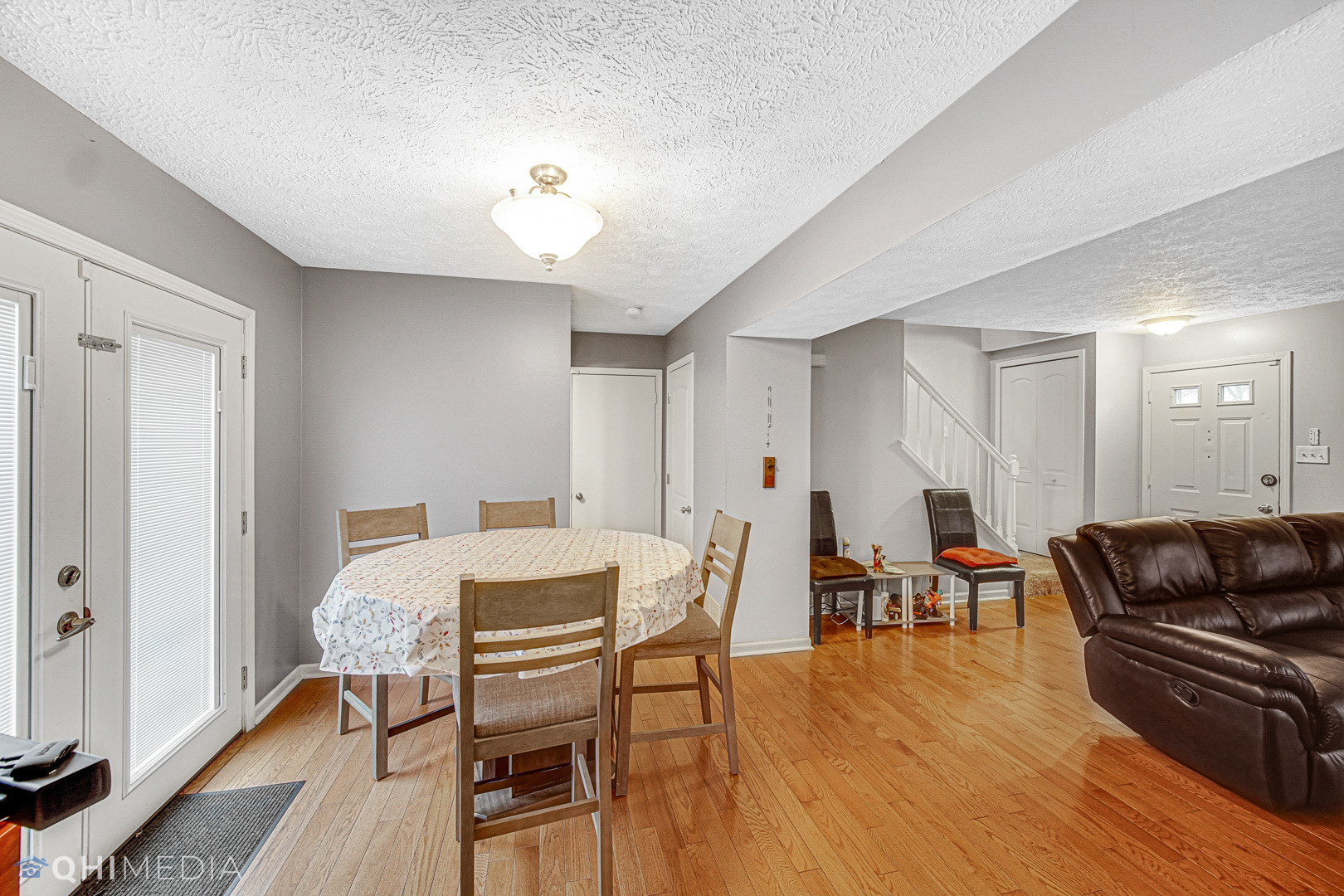 3208 Old Castle Road Joliet, IL 60431 - Photo 7 of 19 a view of a dining room with furniture and wooden floor