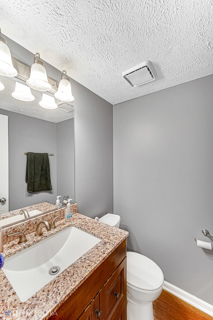 3208 Old Castle Road Joliet, IL 60431 - Photo 8 of 19 a bathroom with a sink and a mirror