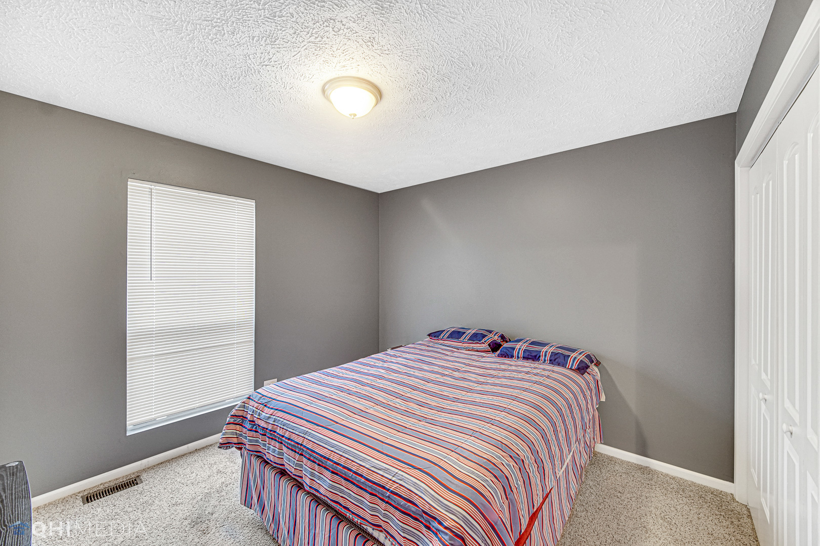 3208 Old Castle Road Joliet, IL 60431 - Photo 10 of 19 a bedroom with a bed and a window