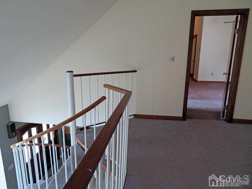 1818 Oak Tree Road Edison, NJ 08820 - Photo 15 of 25 a view of a hallway with staircase