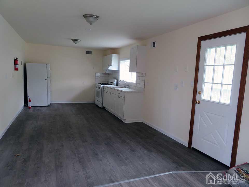 1818 Oak Tree Road Edison, NJ 08820 - Photo 6 of 25 a kitchen with sink and cabinets