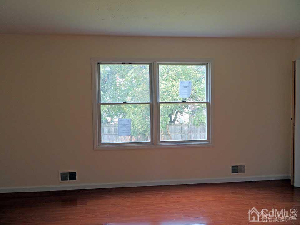 1818 Oak Tree Road Edison, NJ 08820 - Photo 8 of 25 an empty room with a window