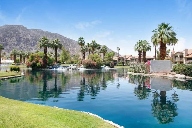 a view of a lake with a mountain in the background