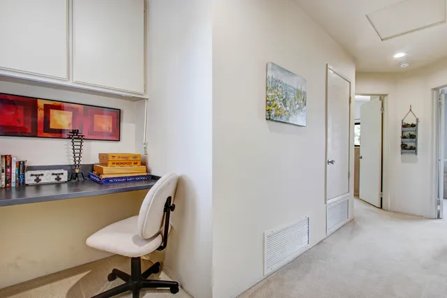 a workspace with furniture and a couch