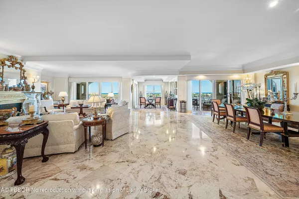 a living room with furniture and flat screen tv