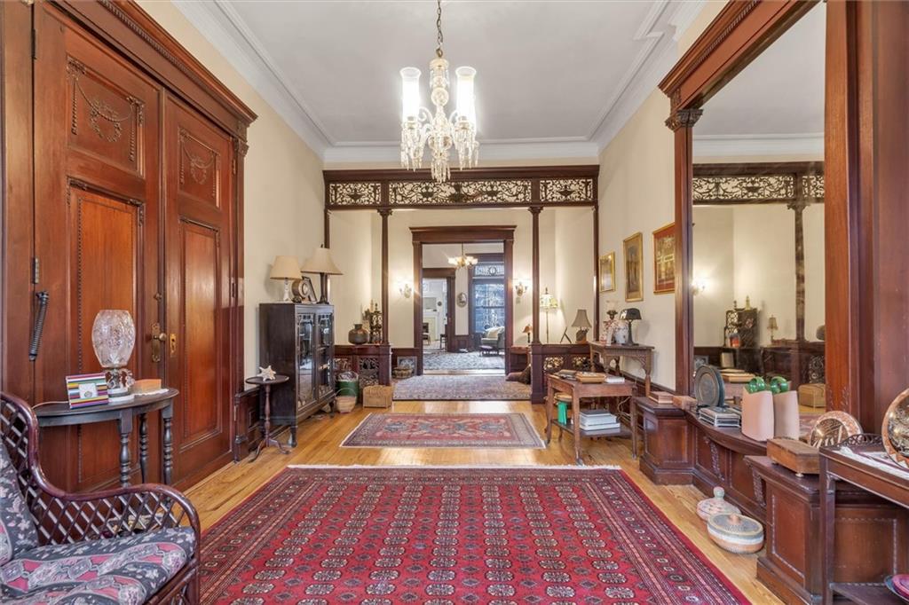 264 Decatur Street Brooklyn, NY 11233 - Photo 5 of 27 a lobby with furniture and chandelier