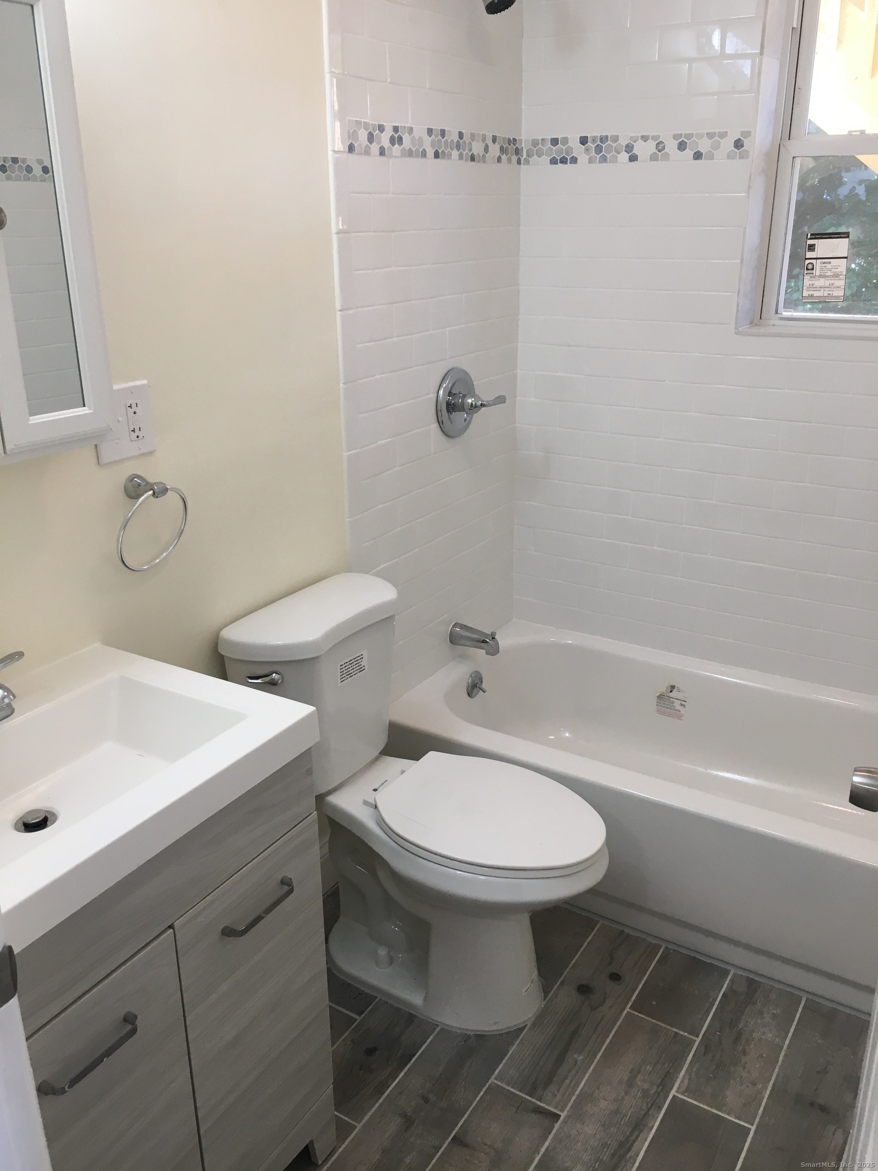 39 Elm Street Shelton, CT 06484 - Photo 6 of 8 a bathroom with a sink toilet and shower