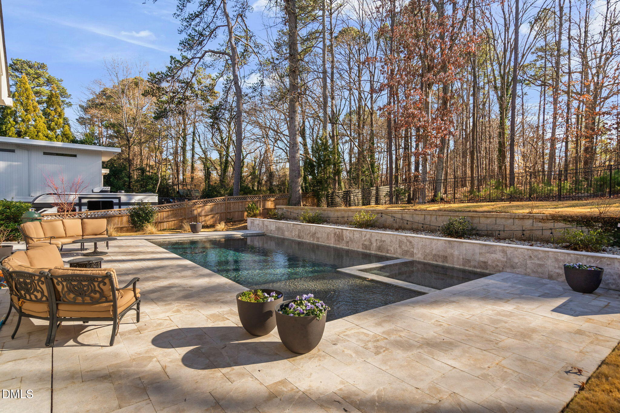 3417 Edgemont Drive Raleigh, NC 27612 - Photo 77 of 83 a view of a swimming pool with a patio