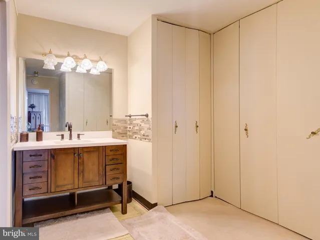 a view of hall way with furniture