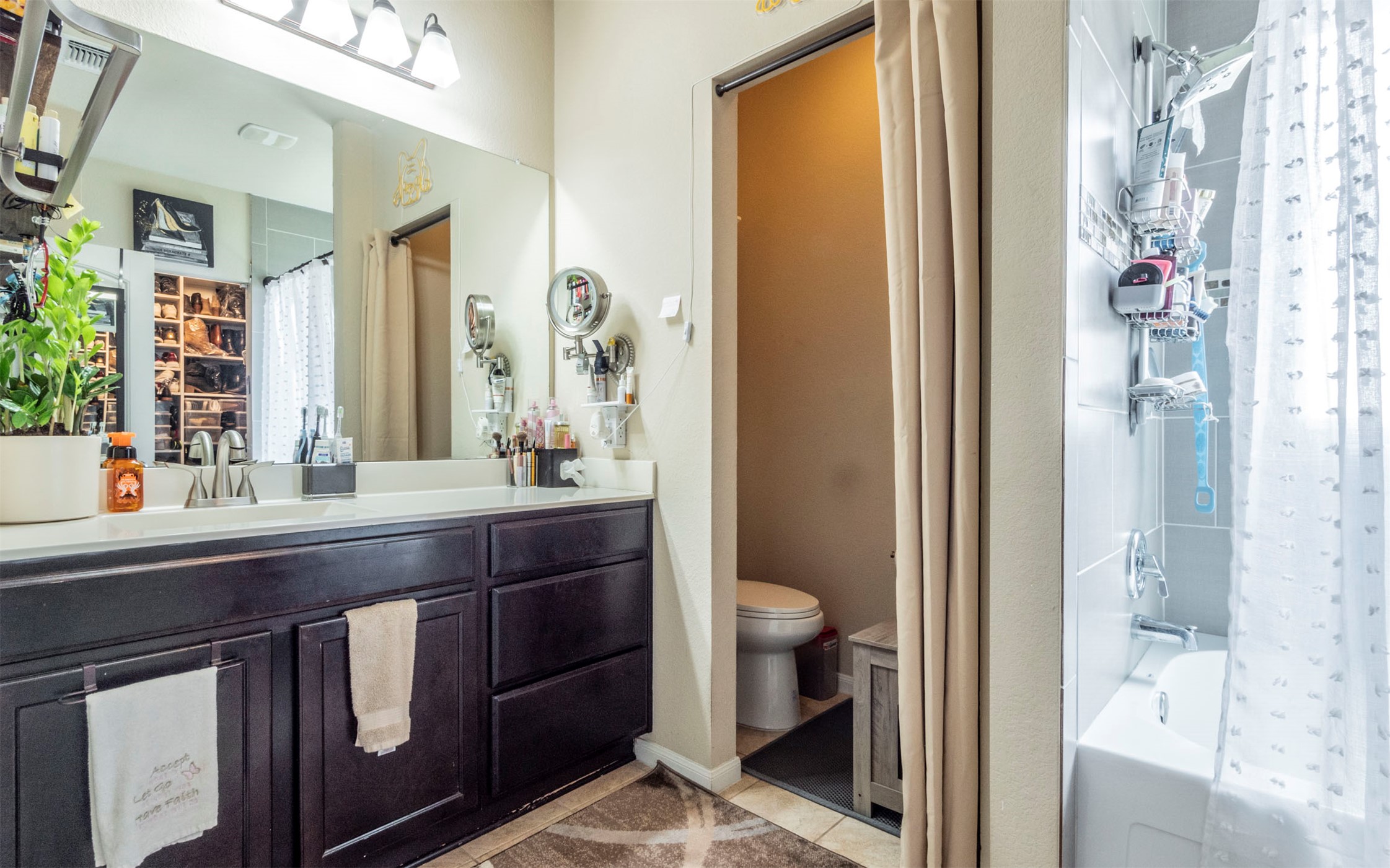 1714 Deodara Drive Cedar Park, TX 78613 - Photo 19 of 37 a bathroom with a sink a toilet and shower