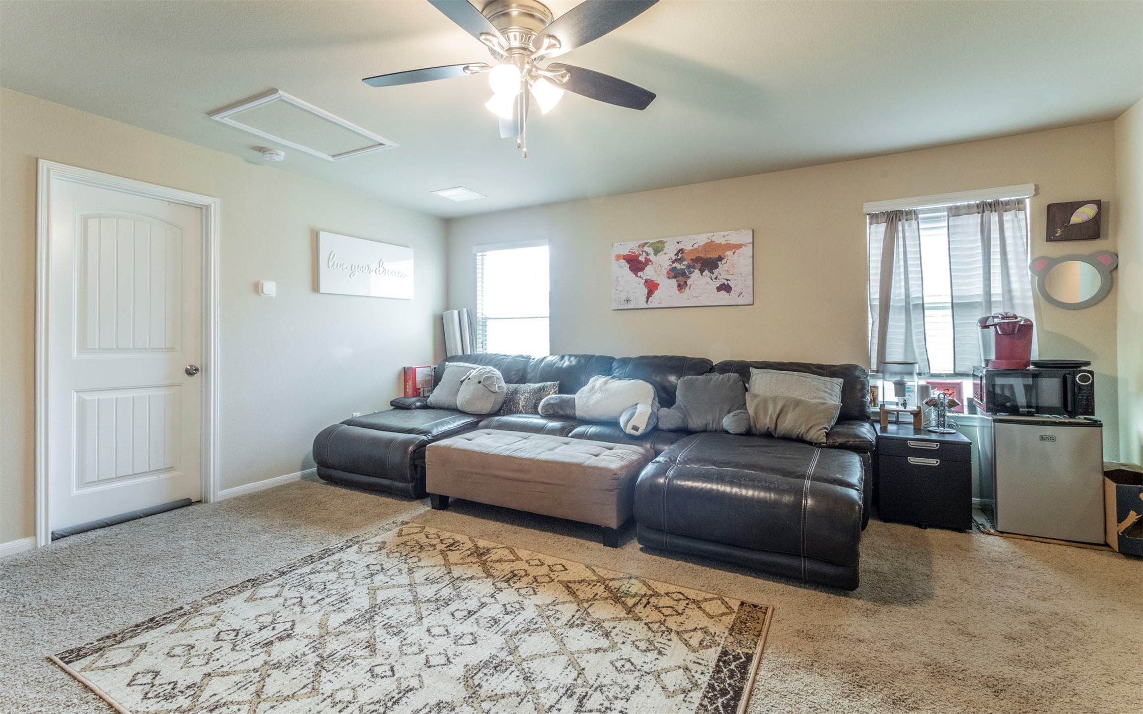 1714 Deodara Drive Cedar Park, TX 78613 - Photo 21 of 37 a living room with furniture and a rug