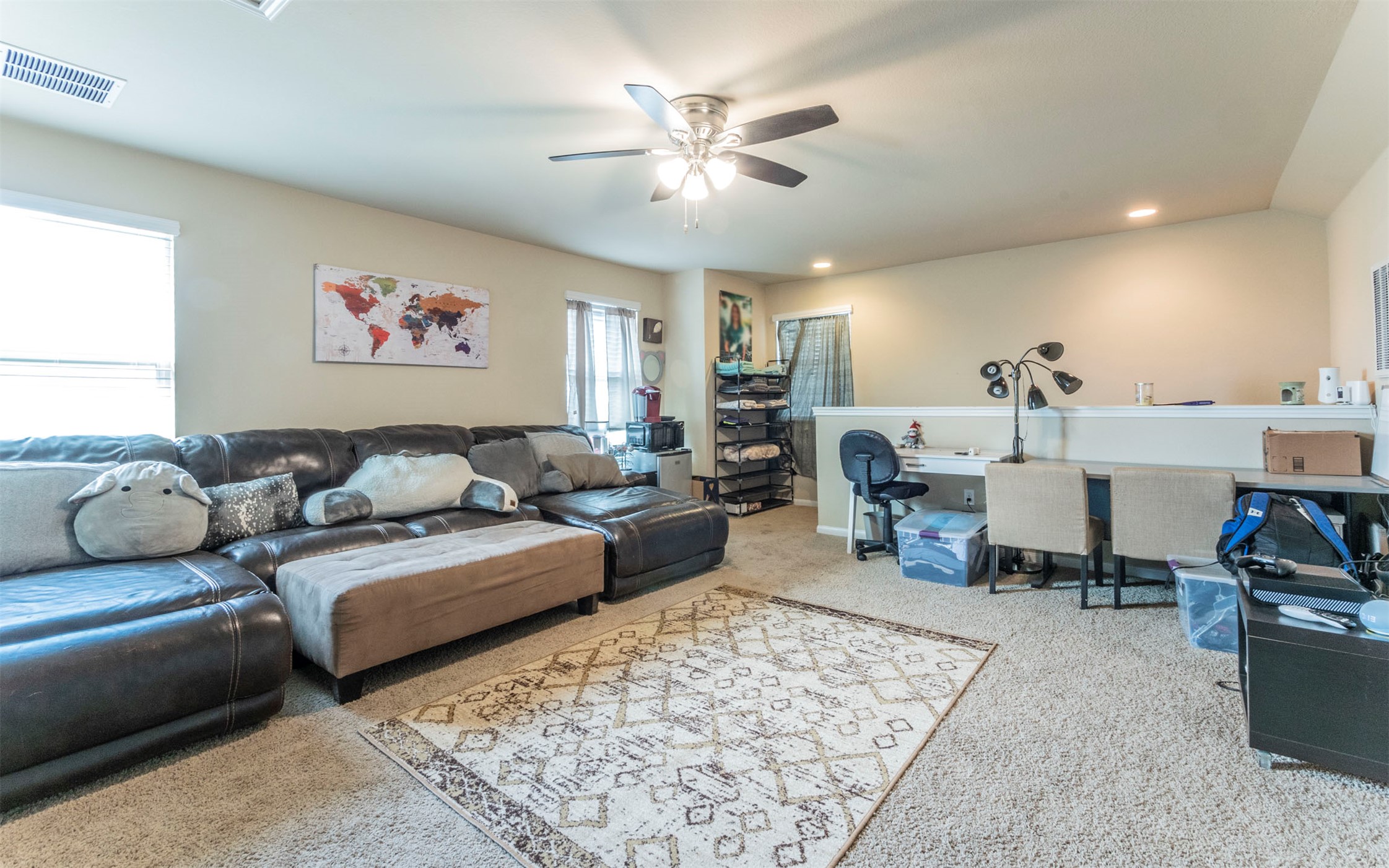 1714 Deodara Drive Cedar Park, TX 78613 - Photo 22 of 37 a living room with furniture and a chandelier
