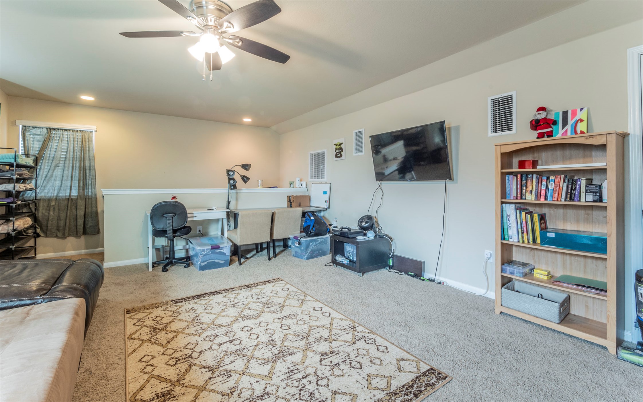 1714 Deodara Drive Cedar Park, TX 78613 - Photo 23 of 37 a living room with furniture and a flat screen tv