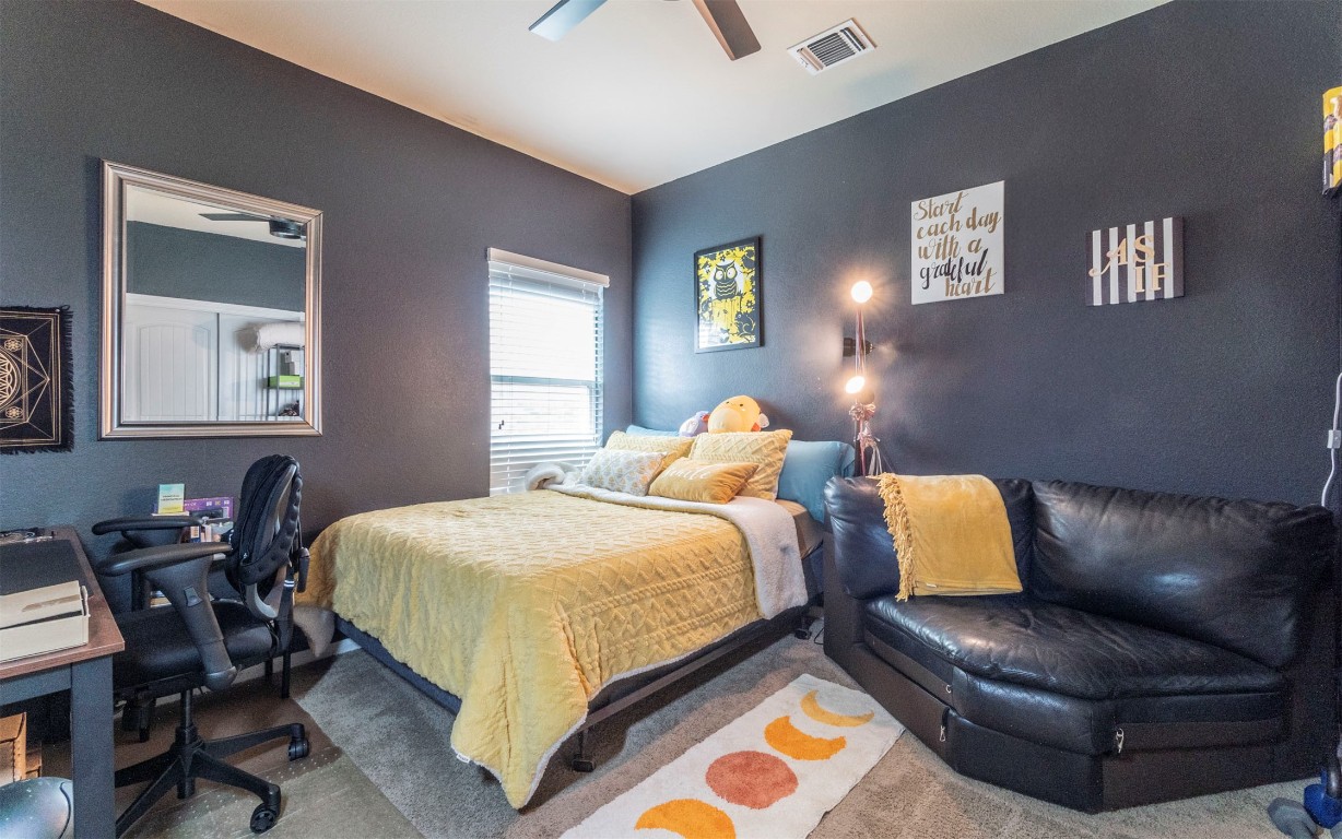 1714 Deodara Drive Cedar Park, TX 78613 - Photo 29 of 37 a bedroom with a bed and chair