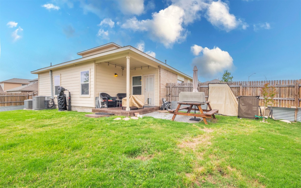 1714 Deodara Drive Cedar Park, TX 78613 - Photo 32 of 37 a view of a house with backyard porch and sitting area