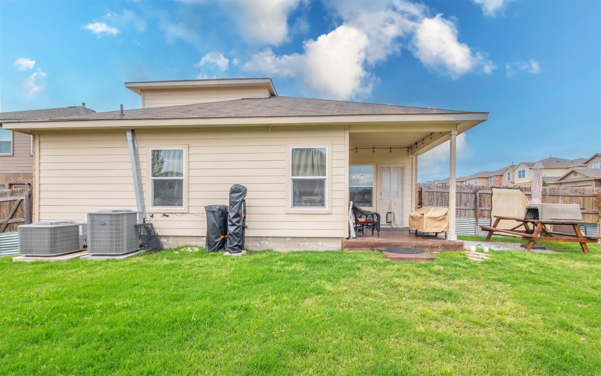 1714 Deodara Drive Cedar Park, TX 78613 - Photo 34 of 37 a front view of house with a garden and patio