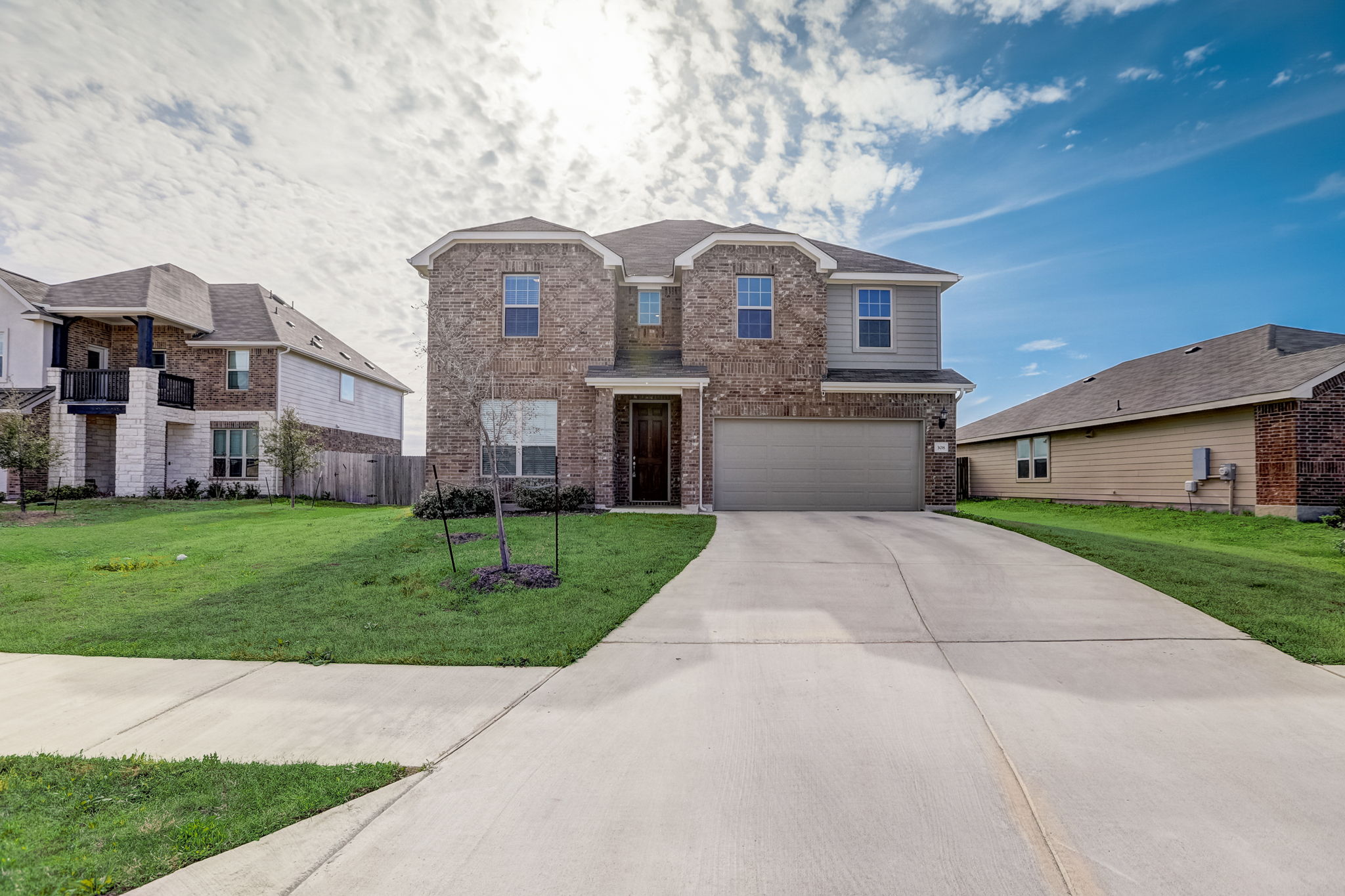 308 Monteforte Road Hutto, TX 78634 - Photo 2 of 32 a front view of house with yard