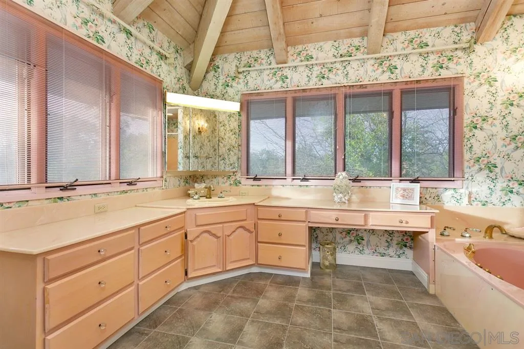 1154 Capra Way Fallbrook, CA 92028 - Photo 15 of 25 a large bathroom with a large tub and sink