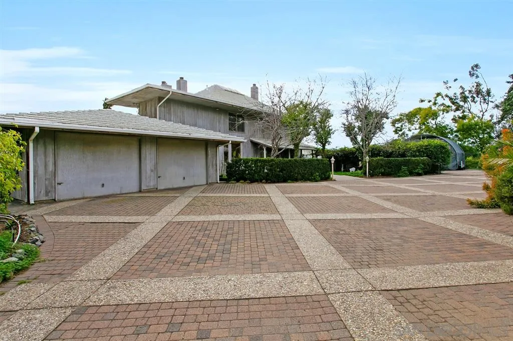 1154 Capra Way Fallbrook, CA 92028 - Photo 3 of 25 a house with trees in front of it