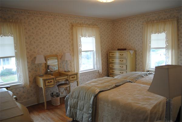 17 Coventry Road Worcester, MA 01606 - Photo 8 of 17 a bedroom with a bed and wooden floor