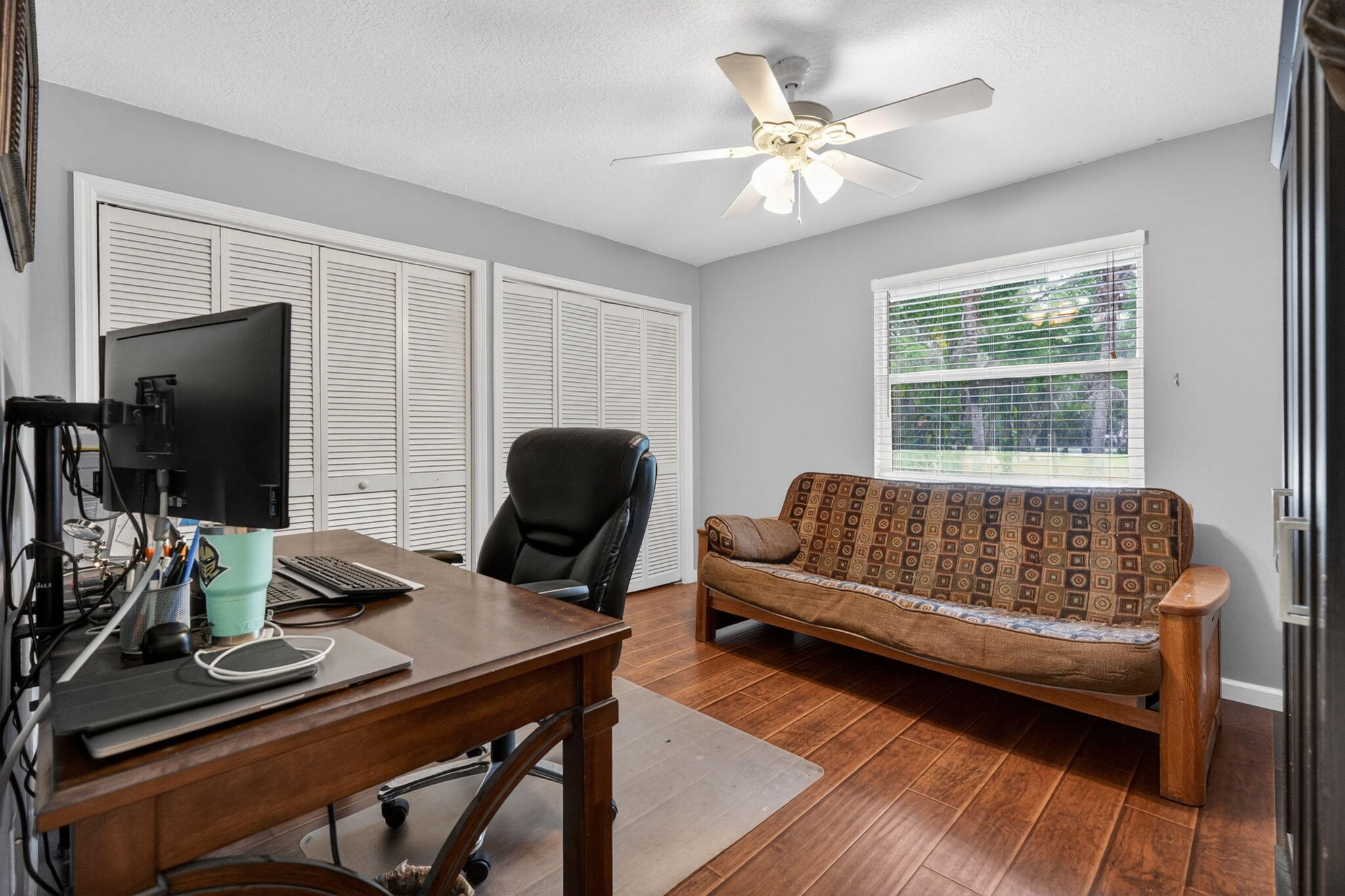 17391 Alexander Run Jupiter, FL 33478 - Photo 23 of 55 a living room with furniture and a window