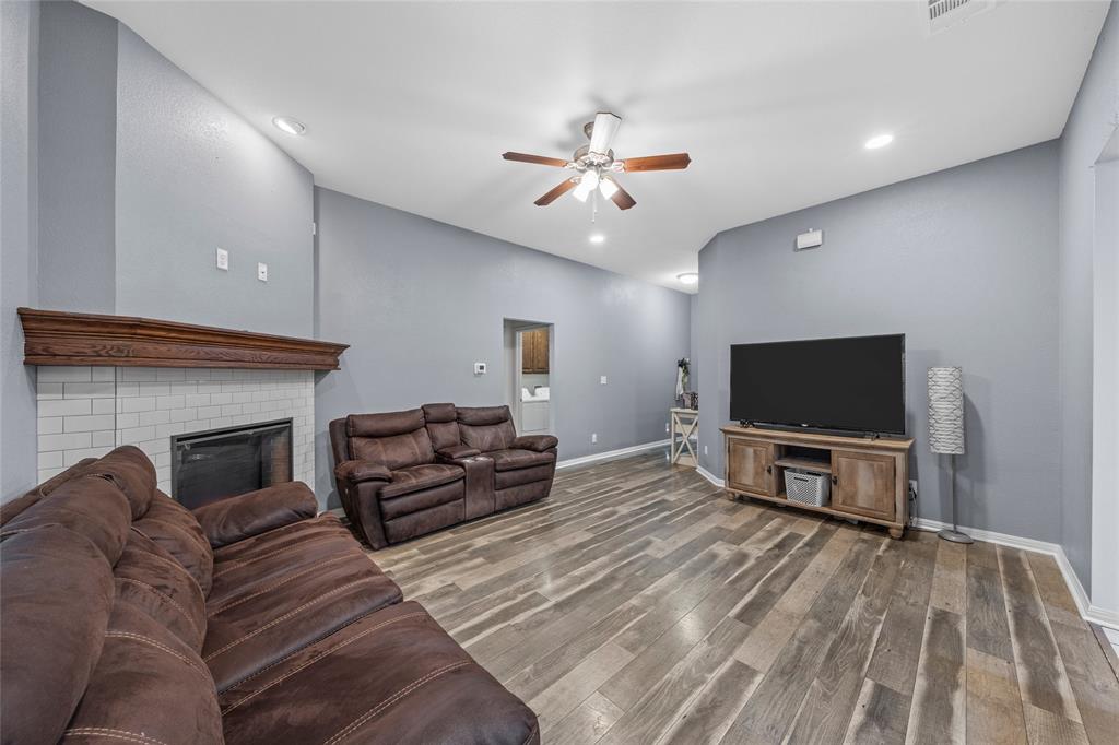 109 Ruby Circle Hewitt, TX 76643 - Photo 2 of 14 a living room with furniture and a flat screen tv