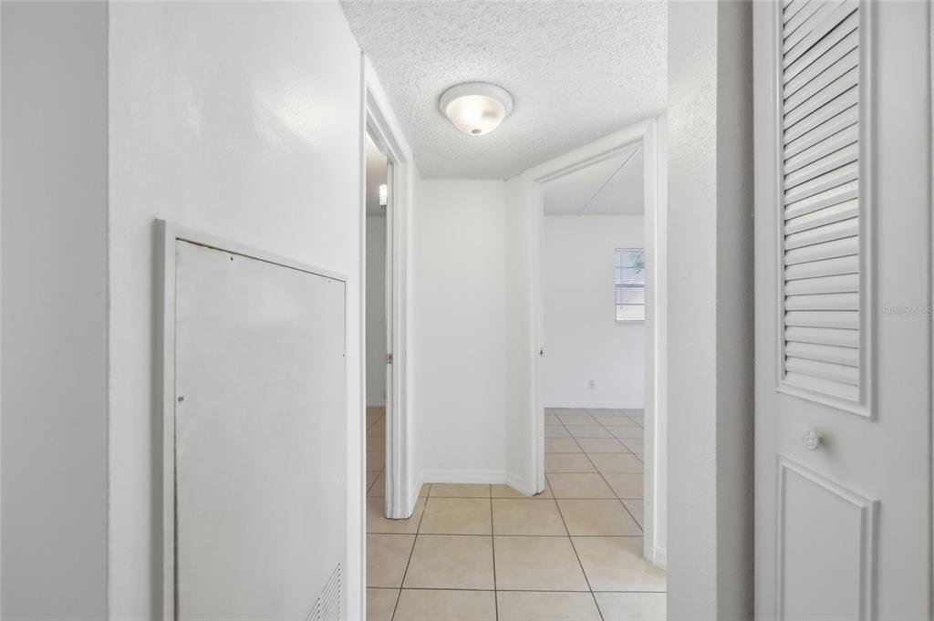 705 Michigan Court, Unit 14 St. Cloud, FL 34769 - Photo 15 of 45 a view of a hallway
