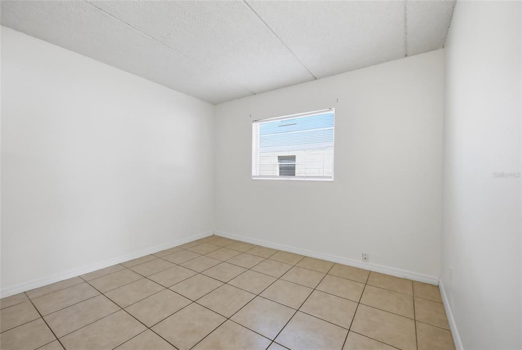 705 Michigan Court, Unit 14 St. Cloud, FL 34769 - Photo 19 of 45 a view of an empty room