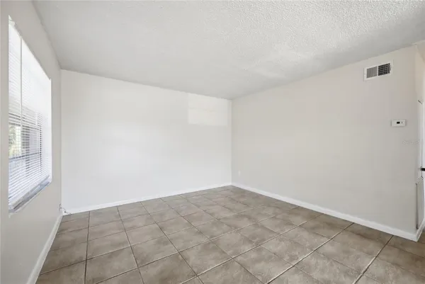 an empty room with a natural light