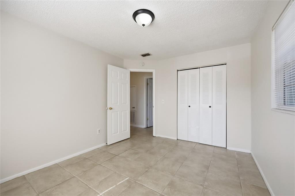 705 Michigan Court, Unit 14 St. Cloud, FL 34769 - Photo 31 of 45 a view of an empty room
