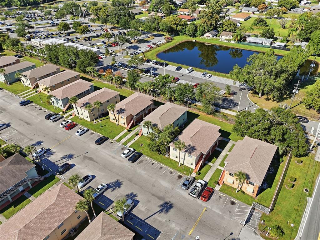 705 Michigan Court, Unit 14 St. Cloud, FL 34769 - Photo 37 of 45 an aerial view of residential houses with outdoor space