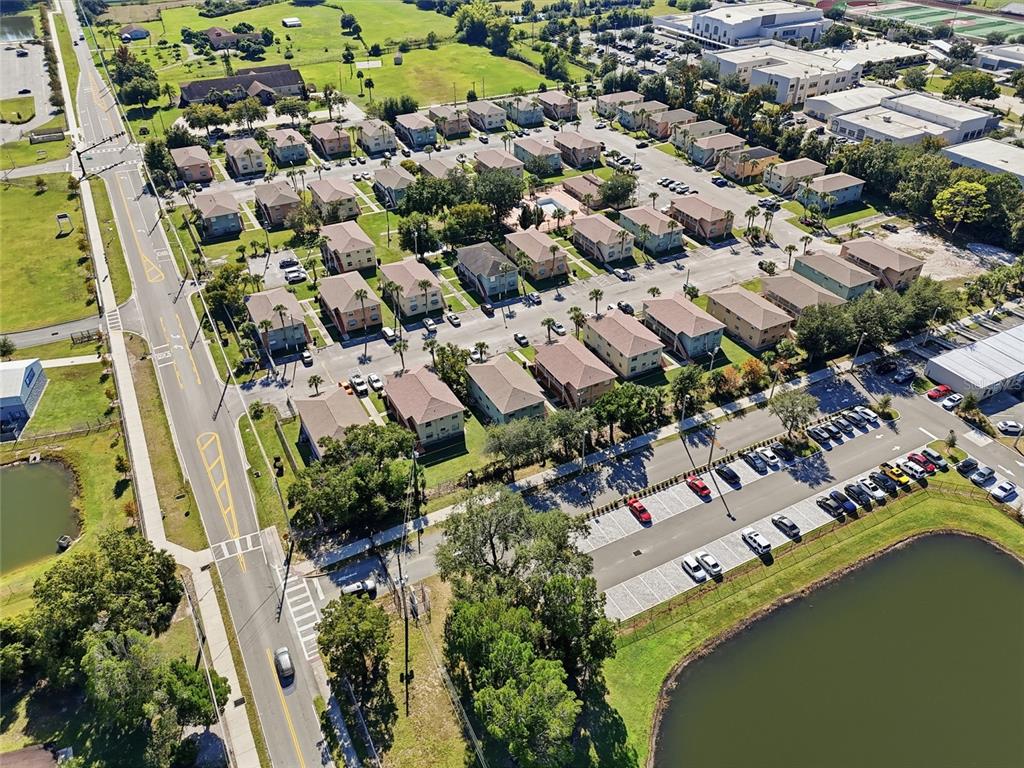 705 Michigan Court, Unit 14 St. Cloud, FL 34769 - Photo 42 of 45 an aerial view of residential houses with outdoor space