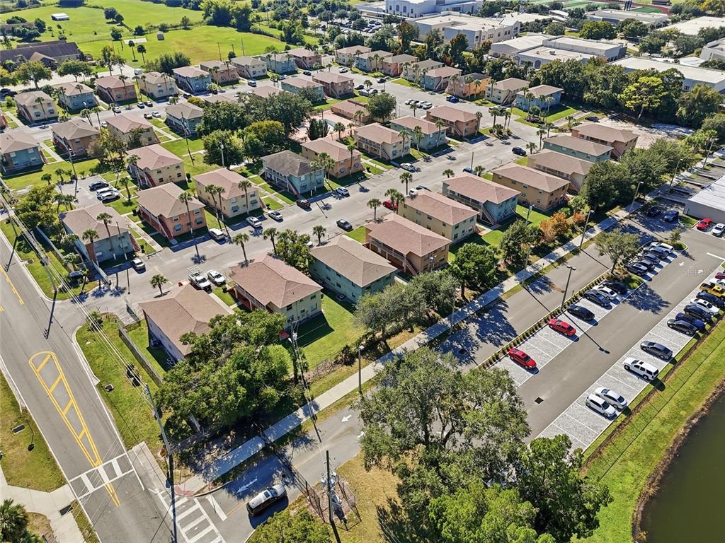705 Michigan Court, Unit 14 St. Cloud, FL 34769 - Photo 44 of 45 an aerial view of residential houses with outdoor space