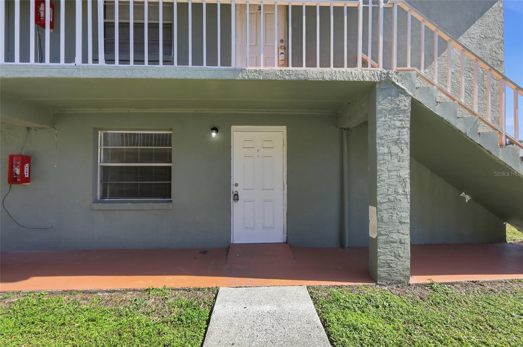 705 Michigan Court, Unit 14 St. Cloud, FL 34769 - Photo 6 of 45 a front view of a house