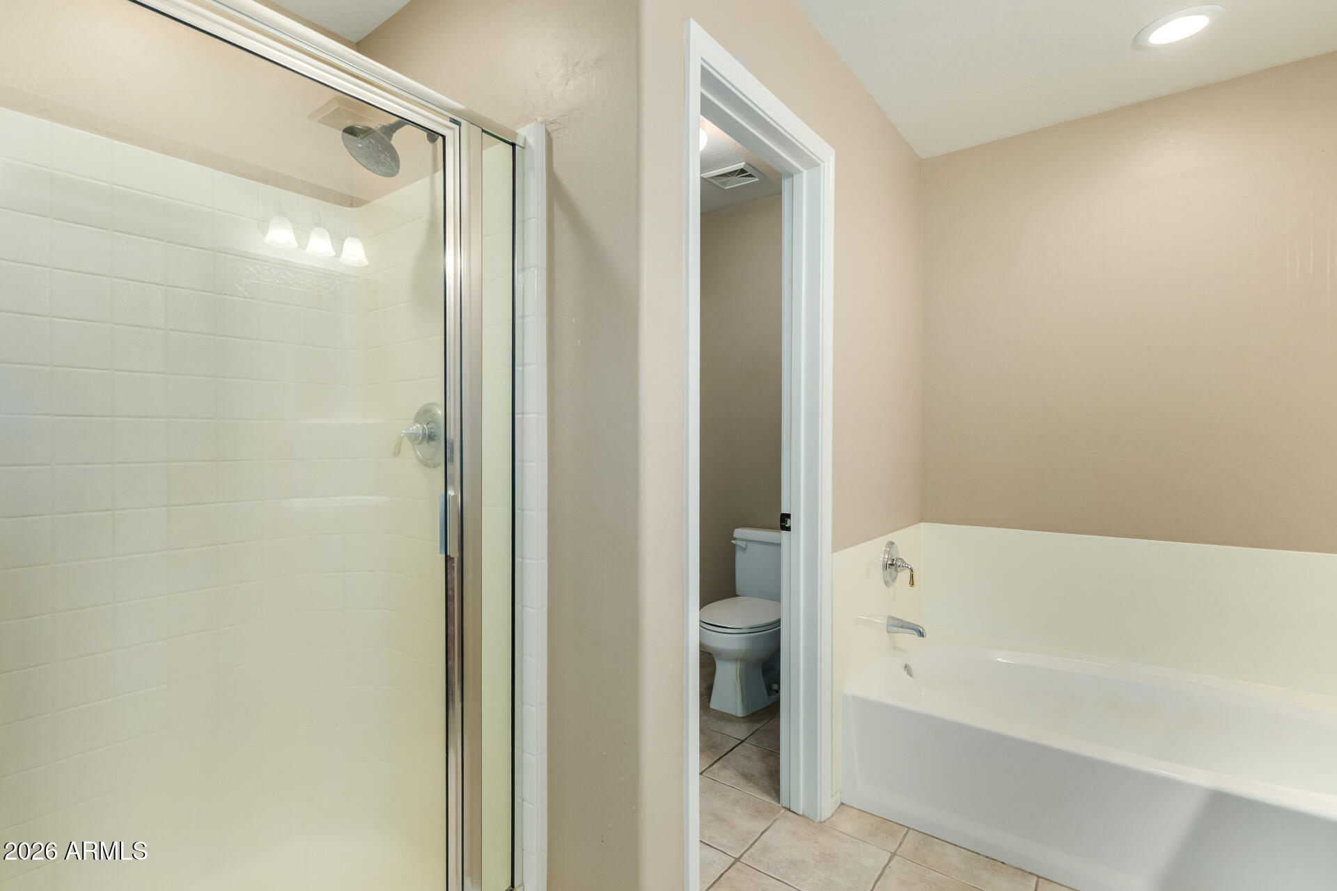 5415 East McKellips Road, Unit 106 Mesa, AZ 85215 - Photo 27 of 45 a bathroom with a bathtub and a shower
