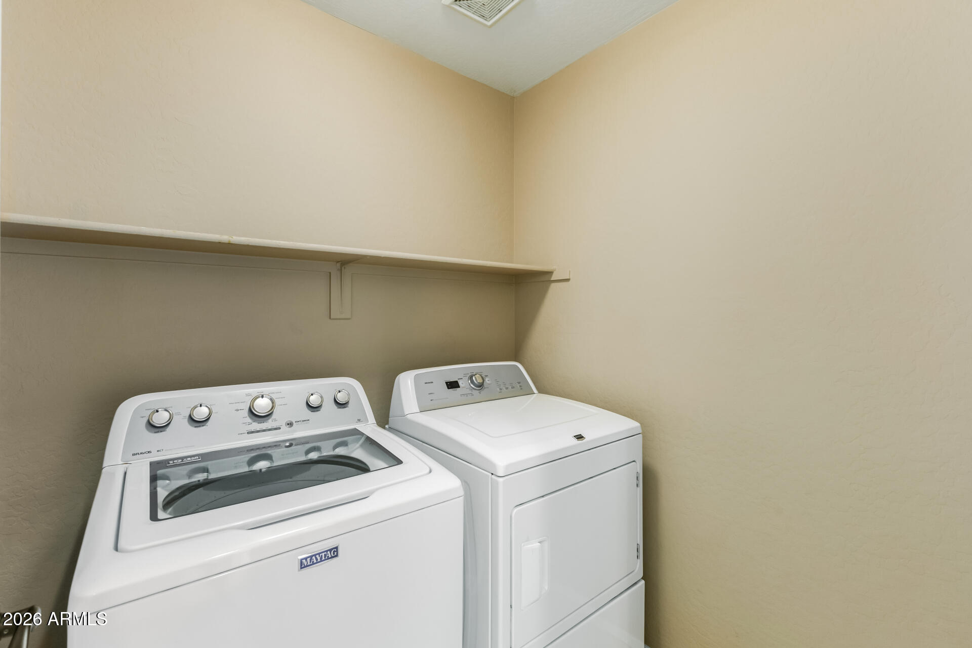 5415 East McKellips Road, Unit 106 Mesa, AZ 85215 - Photo 33 of 45 a utility room with dryer and washer